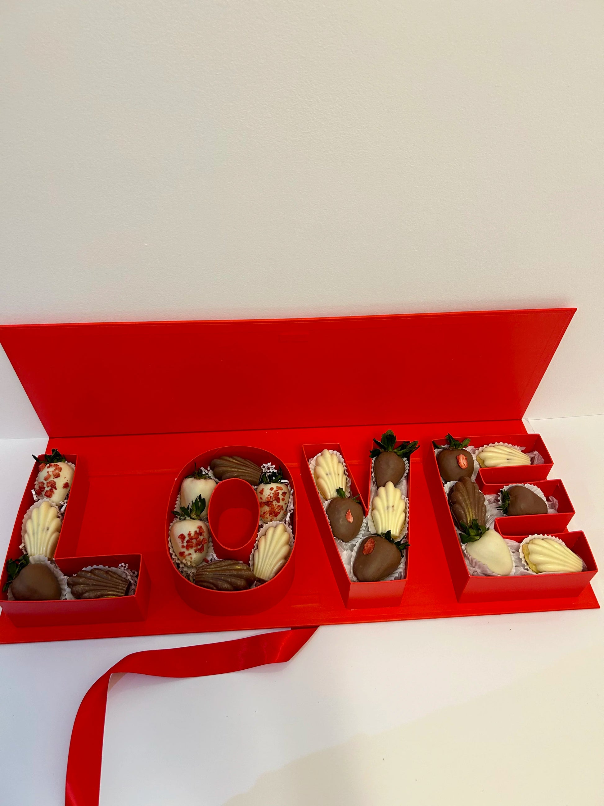 red luxury gift box on white background