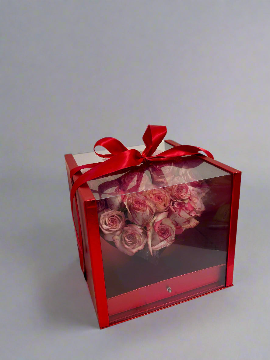 red box with roses on grey background